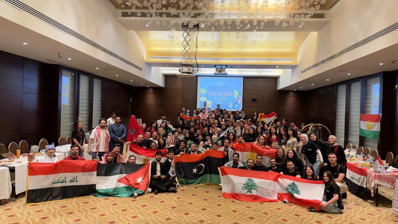 EMR22 participants celebrating during the National Food and Drinks Party