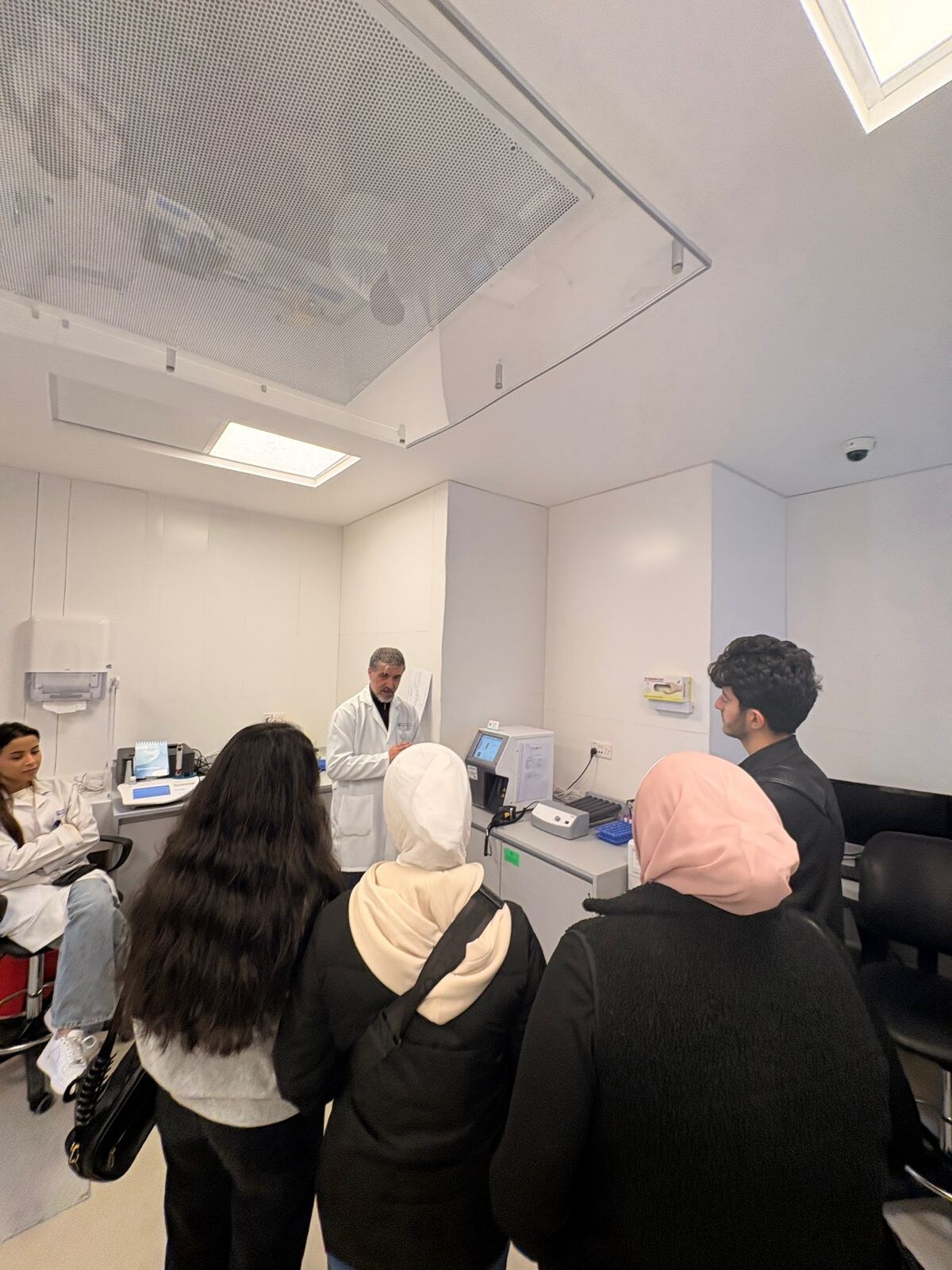 BAU LC members learning during a medical laboratory visit